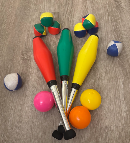 Juggling Equipment Neatly Laid Out On The Floor